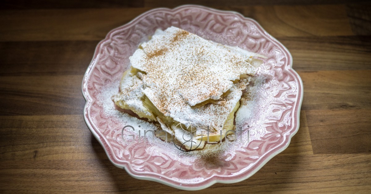 Bougatsa (Filo pastry filled with semolina cream) sprinkled with powdered sugar & cinnamon powder
